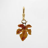 Turn Over a New Leaf Saffron Vintage Enamel Charm