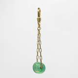 Gorgeous Vaseline Green Glass Antique Bead on Pendulum Circe Charm