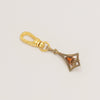 Articulated geometric charm with coral cabochon